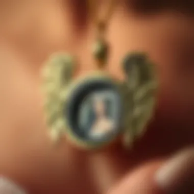 Close-up of an angel wings locket revealing a small photo inside