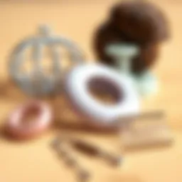 A collection of hair bun tools including a donut bun maker and hair pins