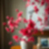 Vibrant red cherry blossom artificial flowers arranged in an elegant vase