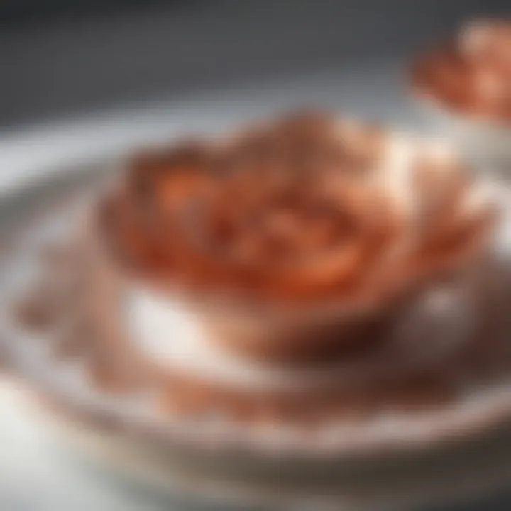 Close-up of intricate rose gold detailing on dinnerware