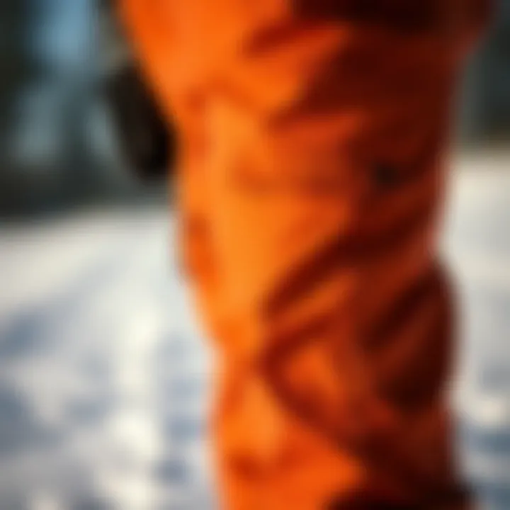 Close-up of pockets and fit details in slim fit snowpants