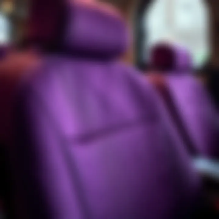 Close-up of a textured purple seat cover highlighting fabric details