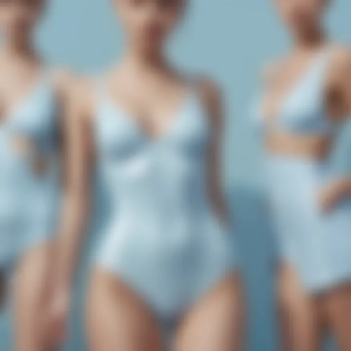 Artistic arrangement of different pale blue swimsuit designs