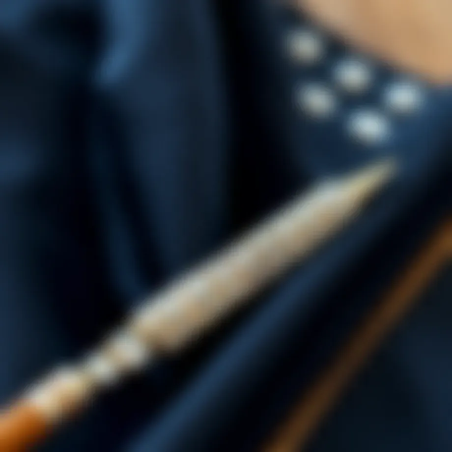 An elegant rhinestone brush tool resting on a fabric swatch