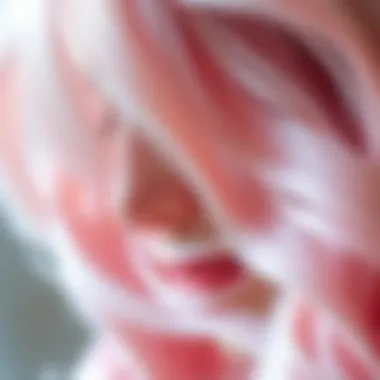 Close-up of the intricate textures and layers of a pale pink wig