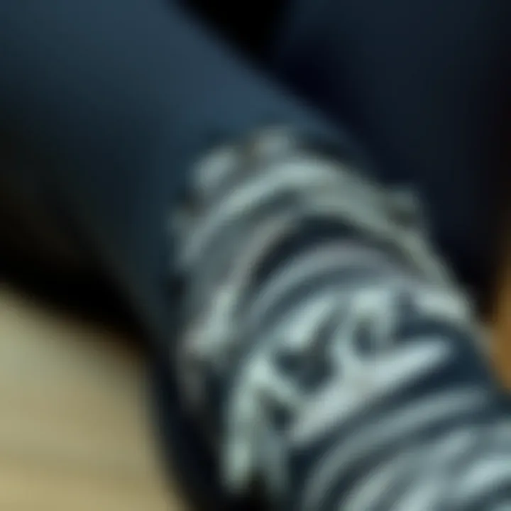Close-up view of fabric texture of shredded leggings