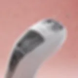 A close-up view of a spring hair removal tool showcasing its unique design and features.