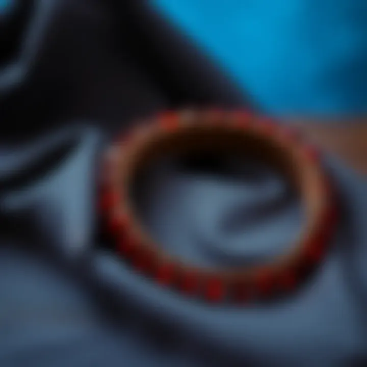 Elegant Display of Red Rhinestone Belt Elegant display of a red rhinestone belt draped over a textured fabric