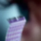 Close-up of a premium eyelash comb showcasing fine bristles